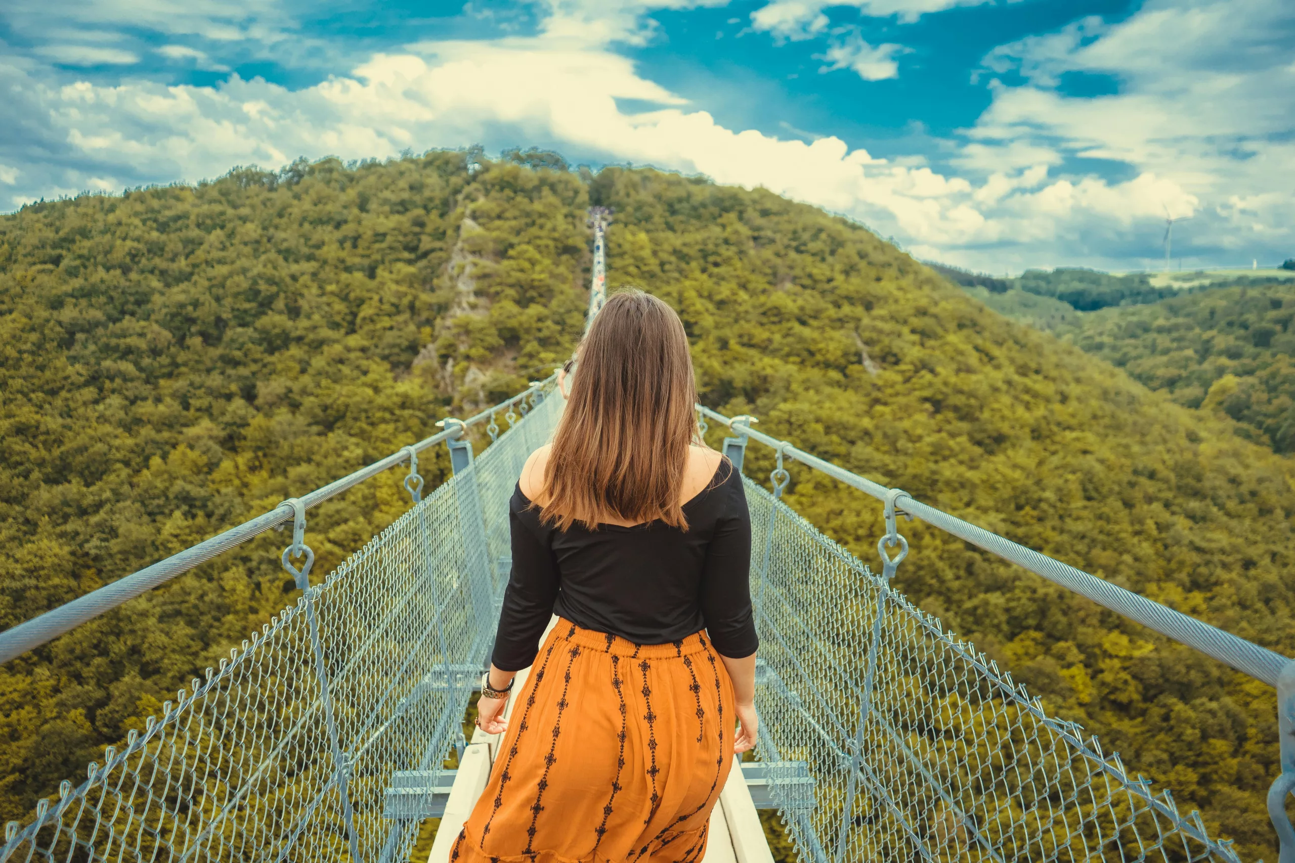 Woman walking the bridge to the future